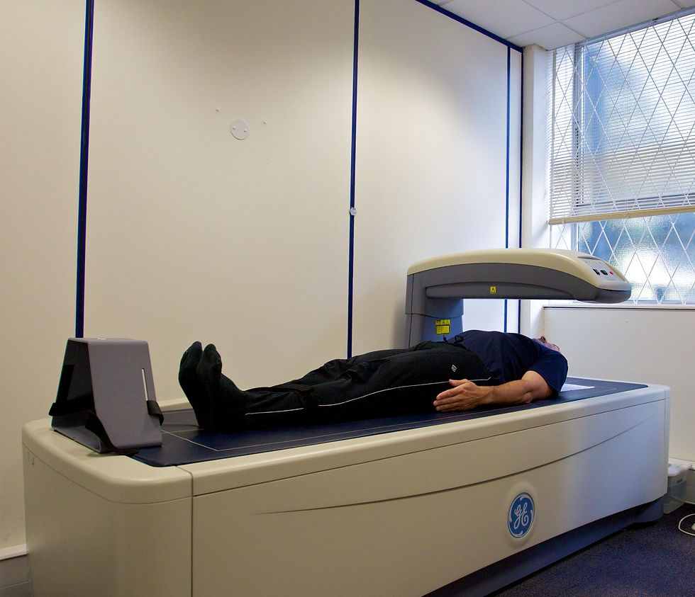 Patient lying on a DEXA bone density scanner table