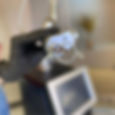 Aplicador do laser CO₂ fracionado utilizado em tratamentos de rejuvenescimento facial na clínica Unisense.