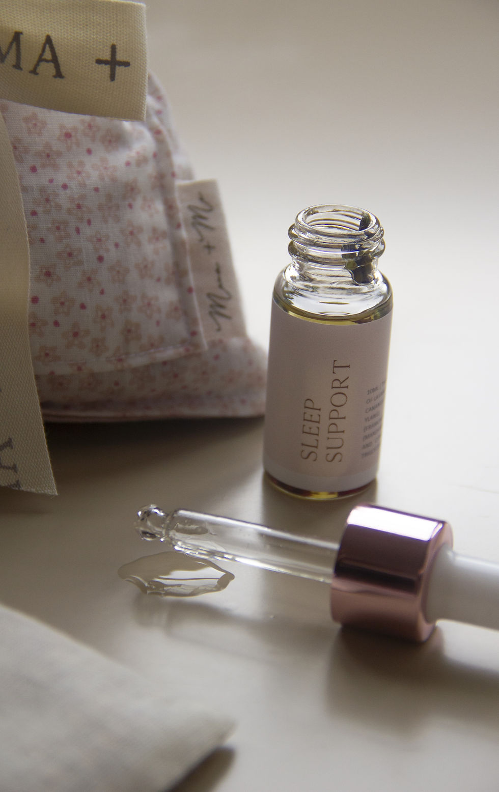 Thumbnail: Postpartum balance. botanical wheatbag. oil dropper. essential oils. rose, lavender, sweet orange. jojoba oil