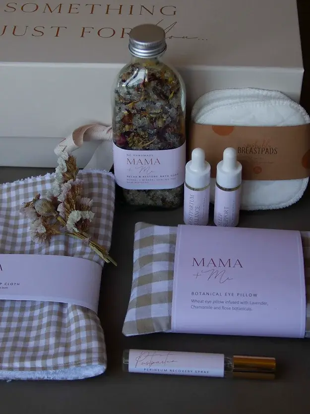 Contents in the Neutral Mama Gift Set |  a burp cloth, eye pillow, botanical oils, breast pads, bath soaks