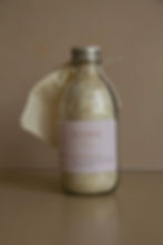 Baby Soothe Soak in an eco friendly glass bottle with a cotton muslin bag. Crushed collodial oats, kawakawa and calendula make a natural and fragrance free bath for a new baby. Makes gifting easy
