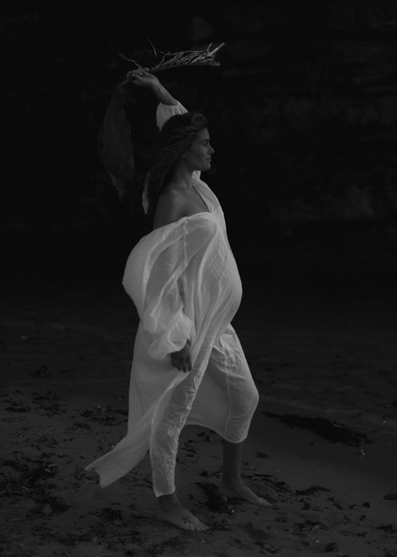 Documentary wedding and family photography across Sydney and NSW Pregnant Women in strong pose on the beach, black and white photography