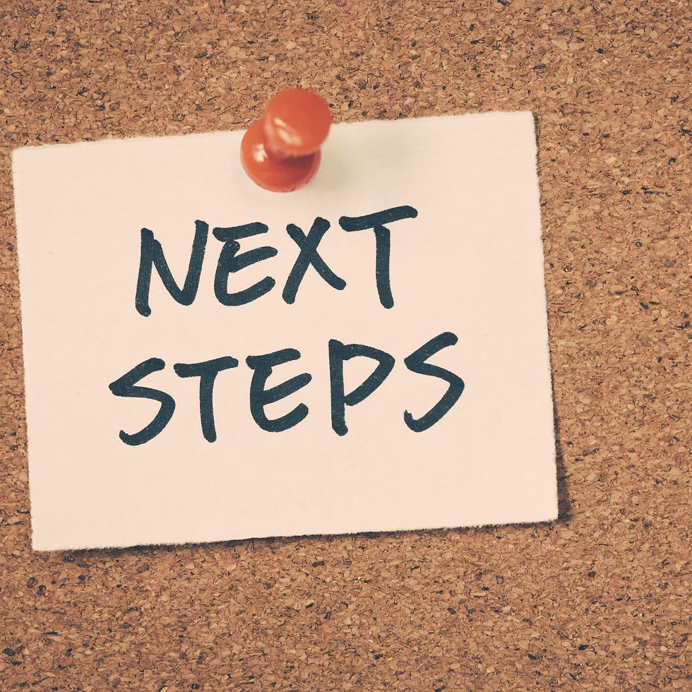 Note with "NEXT STEPS" pinned on a corkboard with a red pushpin, conveying planning or progress. The background is textured brown.