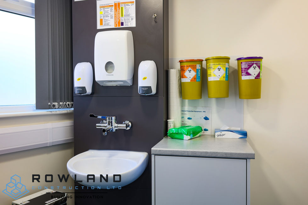 a hospital room with a sink