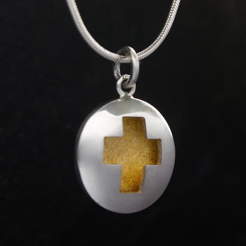 kleiner Kreuz-Anhänger aus Gold 999 und Silber