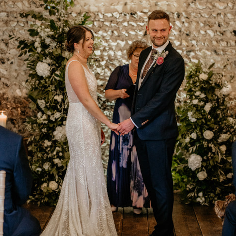 Bride and Groom exchanging vowels in the East Barn.