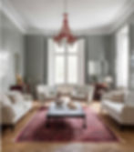 Elegant living room remodel with classic white sofas, red chandelier, and traditional decor by Local Constructions in Orange County