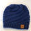 Thumbnail: Blue swirl pattern hat with removable faux fur pom pom