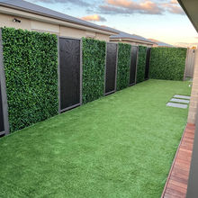 artificial grass with artificial garden wall and decorative metal panel feature wall
