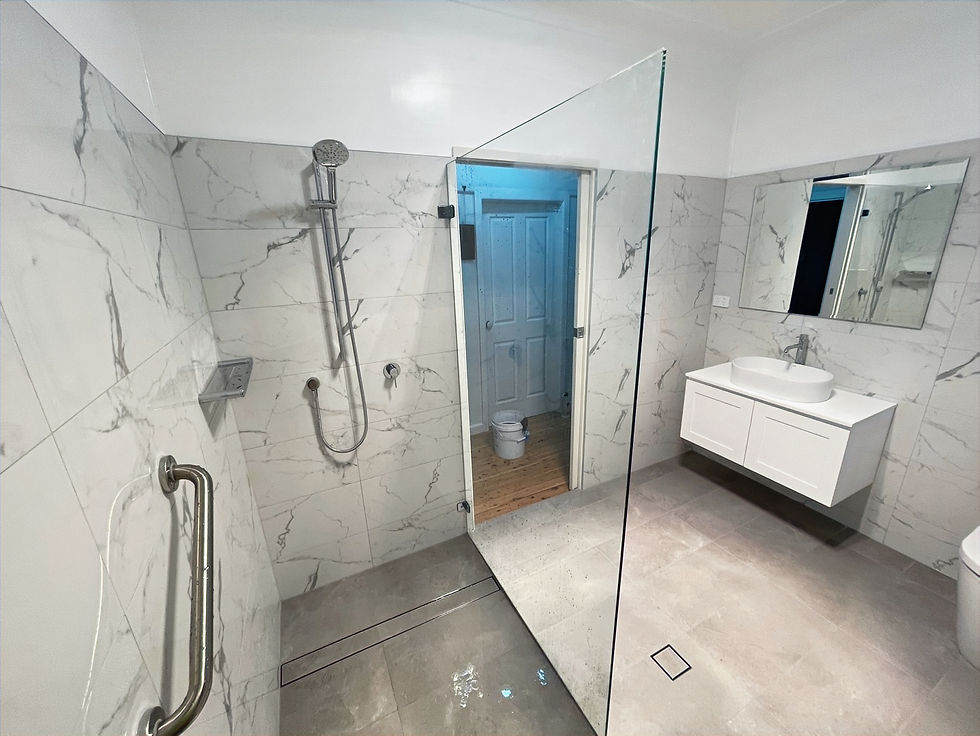 Removed an old bathtub and created a spacious walk-in shower_edited