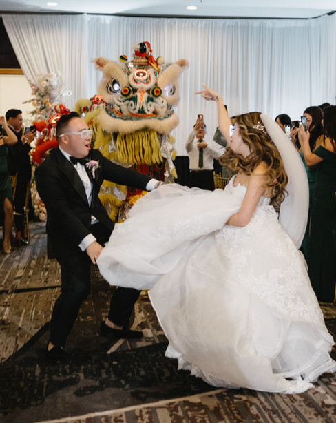 bride and groom entering wedding reception during grand entrance