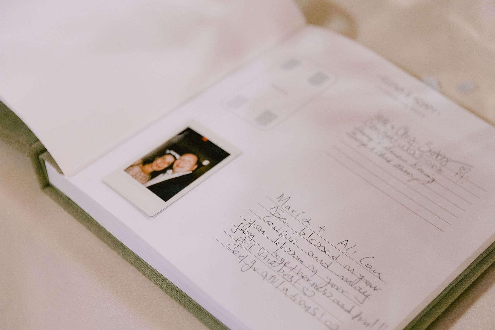 wedding guest book with polaroid picture