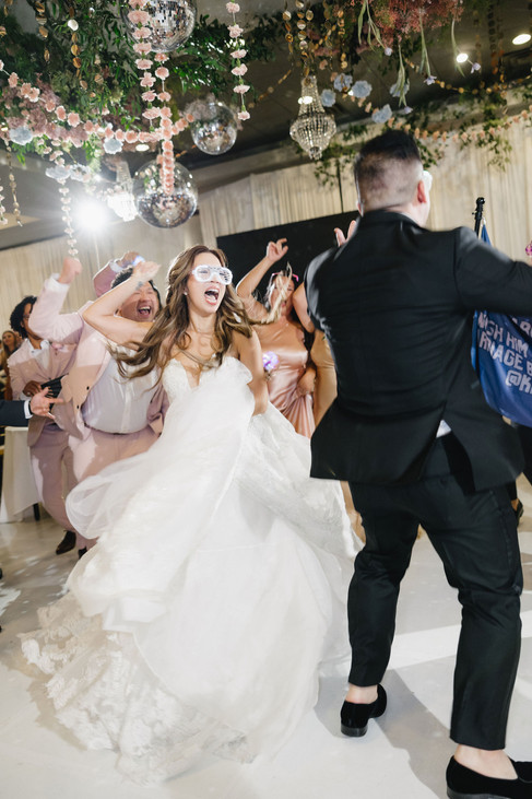 wedding party entering wedding reception during grand entrance