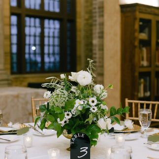green, ivory, and gold wedding tablescape and decor