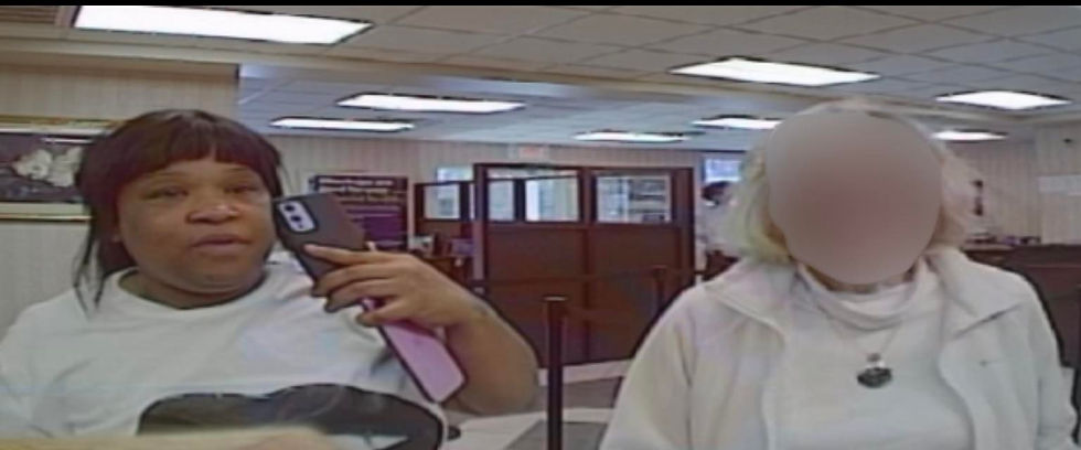 Dorothy Watkins with victim at bank