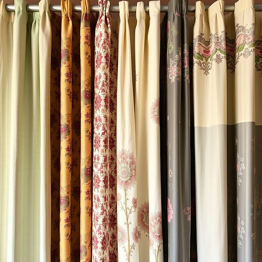 several curtains of different colours