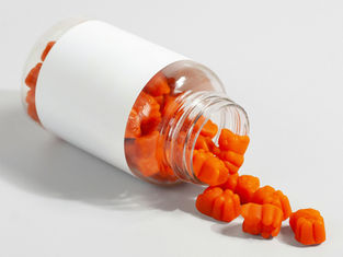 Bottle of orange supplements used for ADHD in children