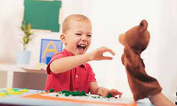 Client enjoying expressive language therapy.