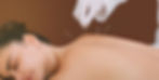 A woman receiving acupuncture