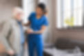 Young caring african nurse helping senior old elderly man grandfather walk . Disable old m