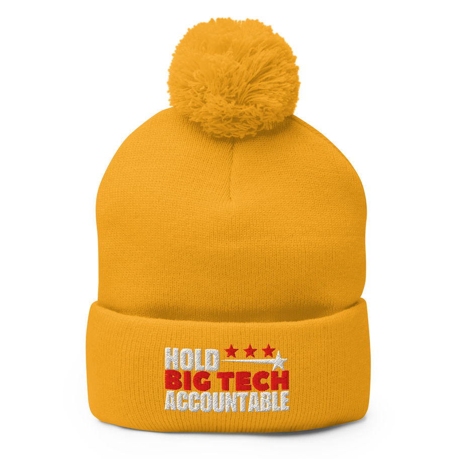 Yellow beanie with text: Hold Big Tech Accountable. A warm winter hat.