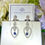 Thumbnail: Captivating antique-inspired blue sapphire cz drop earrings