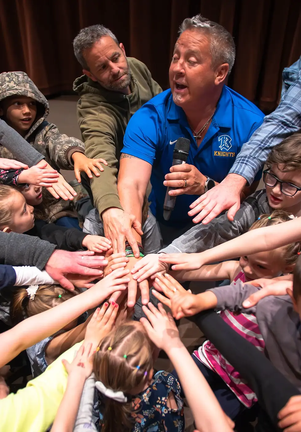 9. Kirk and Coach Kennedy story hour team breakdown.webp