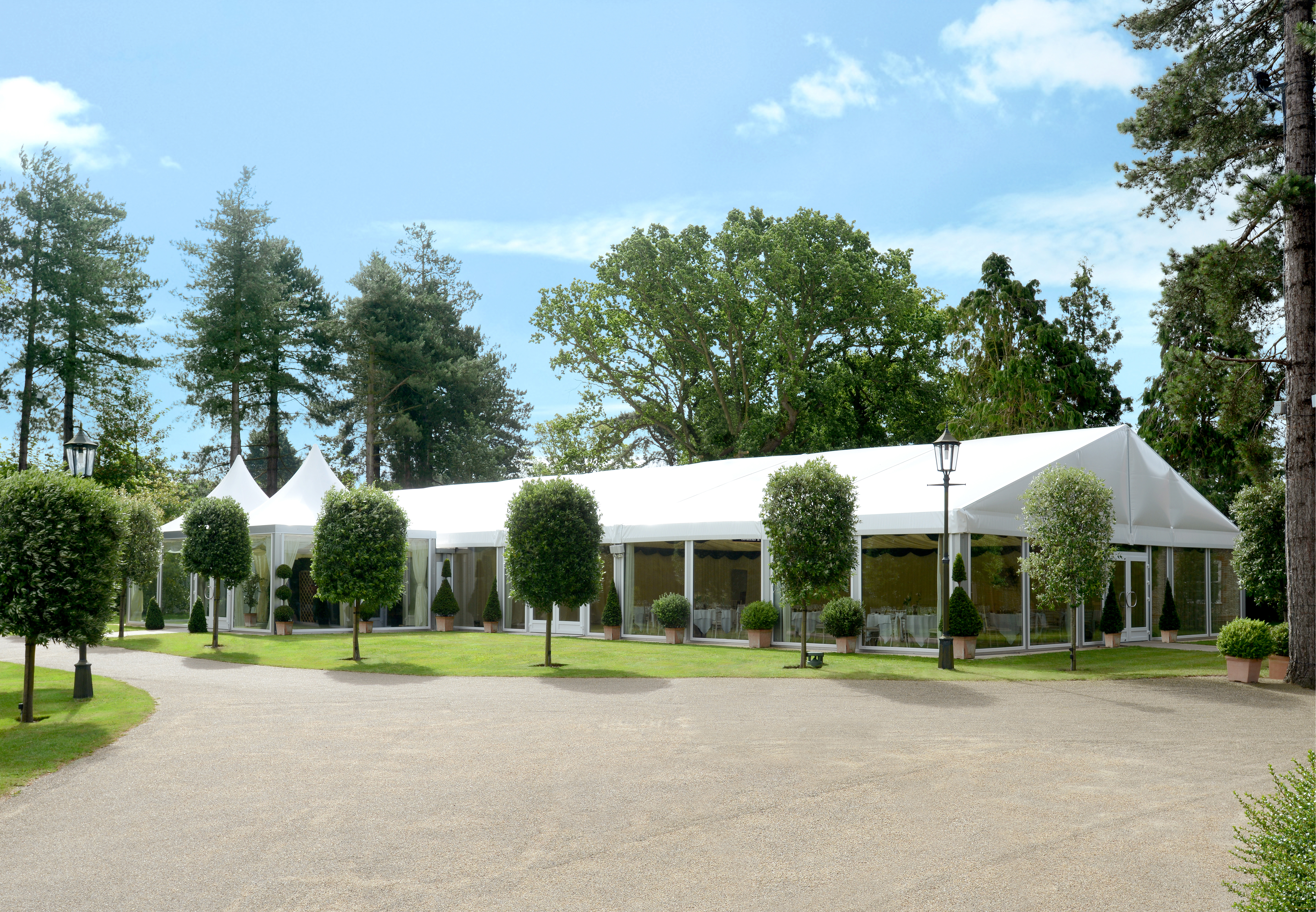 outside of thursford garden pavilion venue surrounded by trees