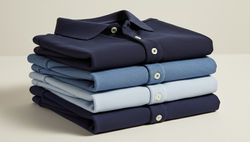 freepik__a-neatly-stacked-pile-of-polo-shirts-arranged-in-s__33273