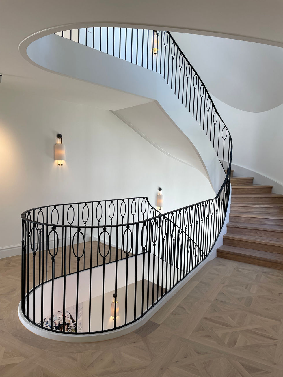Metal staircase clad in oak