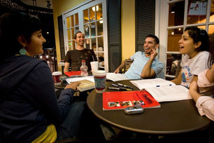group of friends studying the Baha'i Writings together