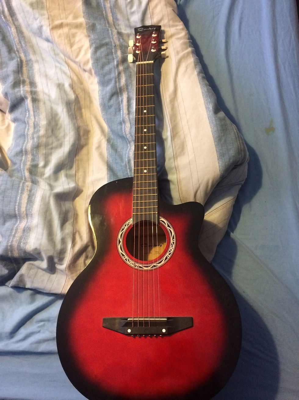 A Cowboy Acoustic in red.