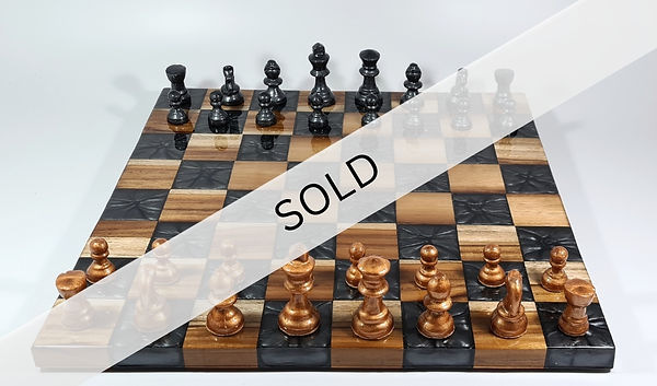 BLACK CHESS SET SOLD.jpg