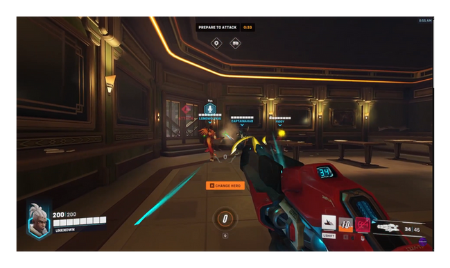 The gameplay screen for Overwatch showcasing the heroe's abilities, health bar, and objectives in the UI