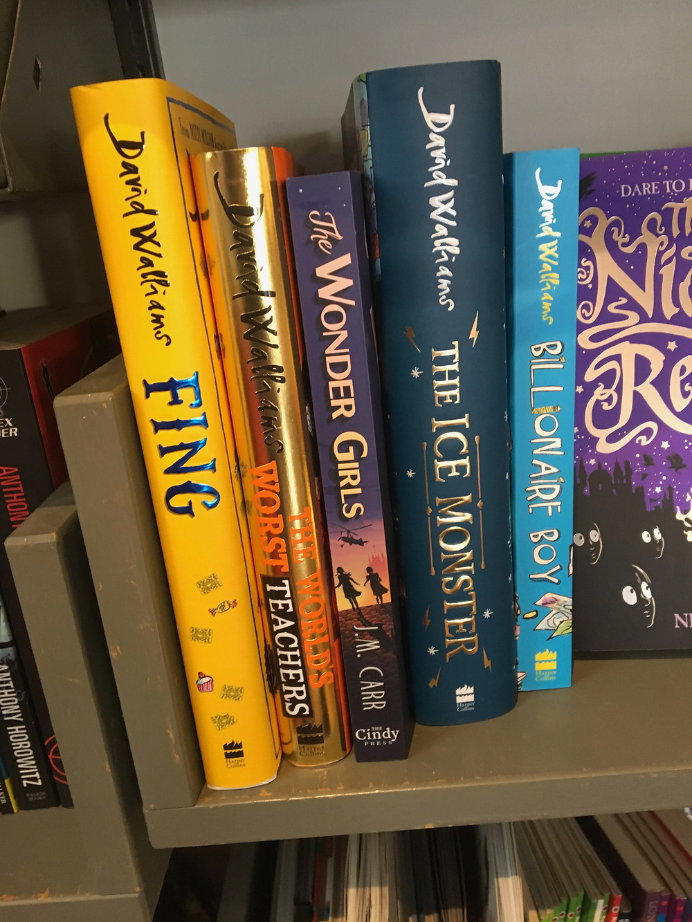 picture of The Wonder Girls on bookshop shelf with books by David Walliams