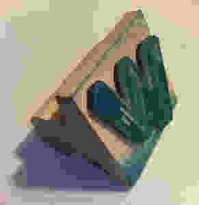 A wooden 'W' stamp