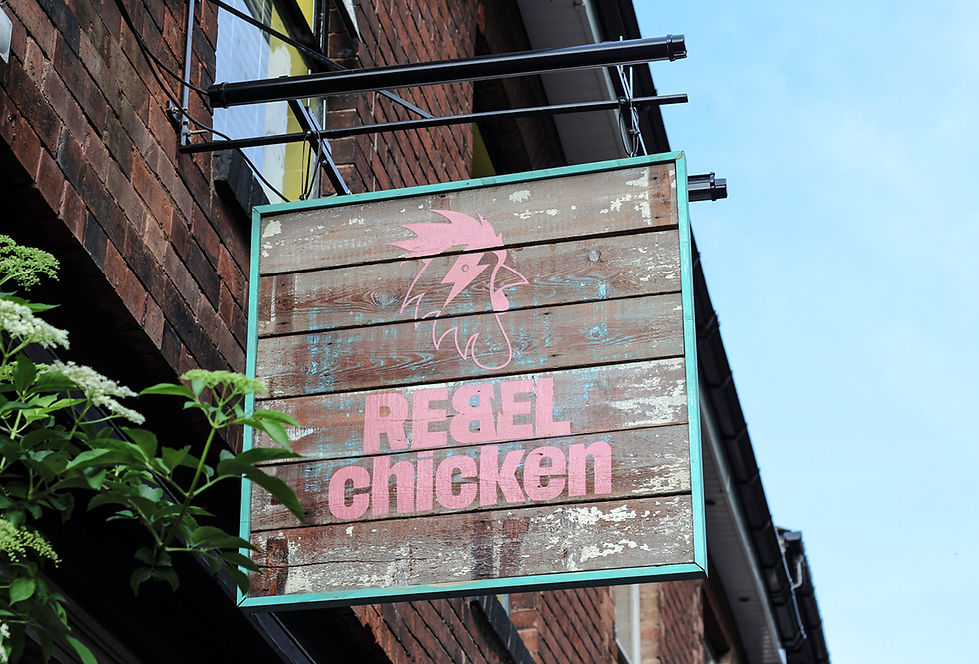 Rebel Chicken food packaging and signage – illustration-led design for hospitality brand