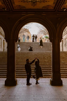 Couple under building to show central park proposal spots