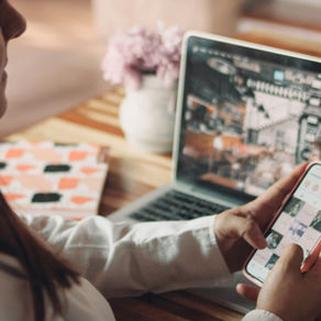 Travel agent for honeymoons working on her phone