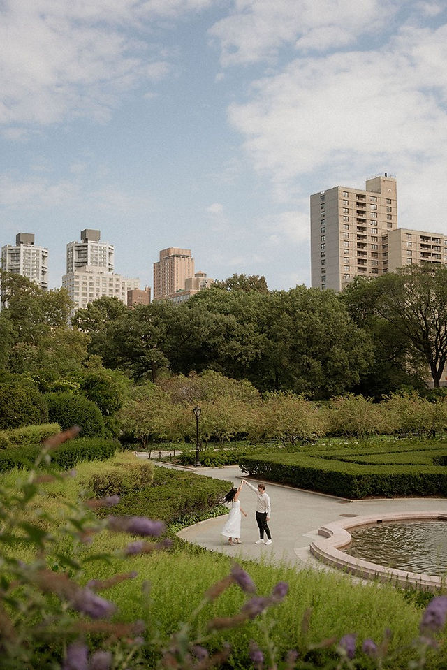 engagement photographer NYC couple during engagement session in New York City at conservatory garden engagement photos
