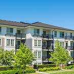 Brand_new_suburban_apartment_building.jpg
