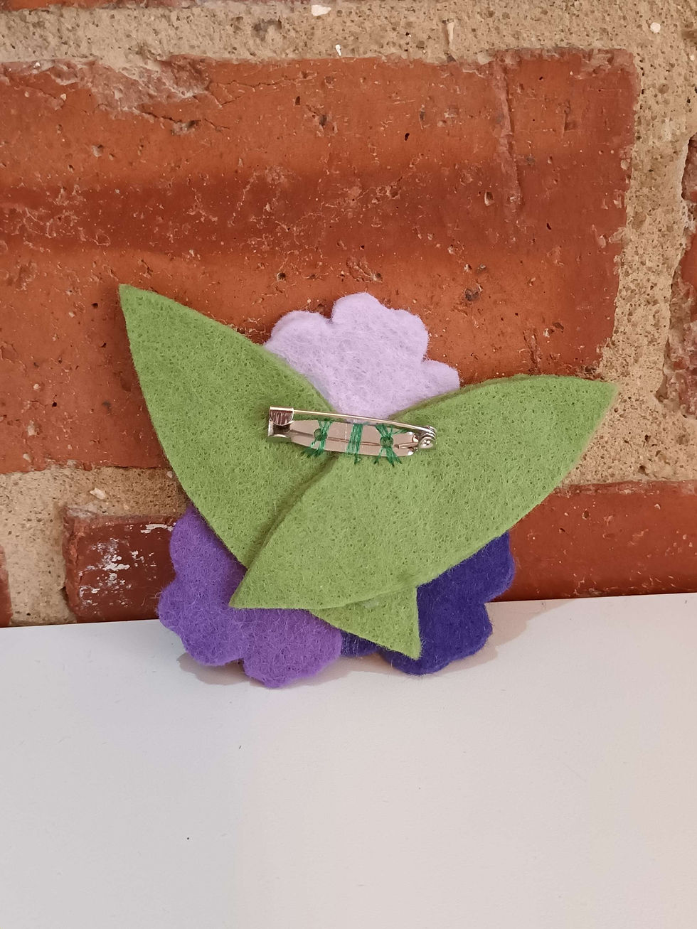 Thumbnail: Hand made felt brooch.   (601)