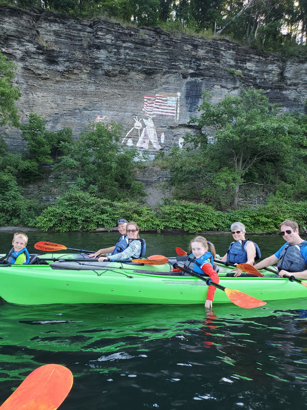 Family kayaking on Seneca Lake