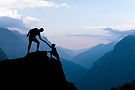 hikers-helping-each-other-to-summit-on-mountain-2026-03-09-03-26-33-utc.jpg