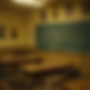 Desk and blackboard.png