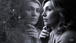 woman reflecting out of the window
