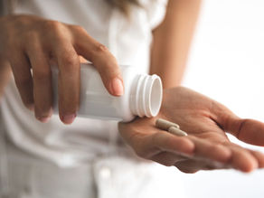 woman taking vitamins