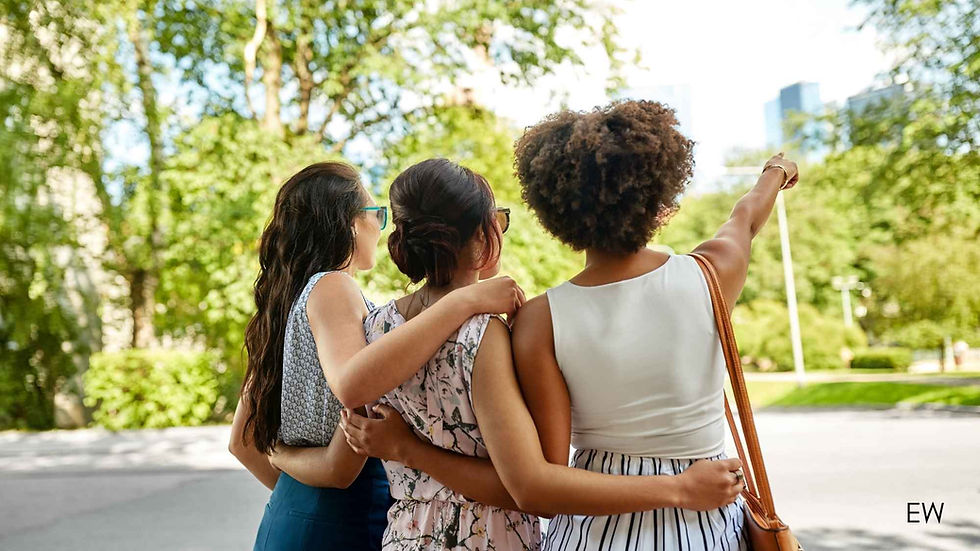 3 Friends hugging showing their backs