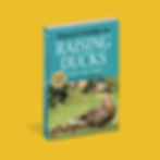 Isometric view of the Storey's Guide to Raising Ducks on a yellow background