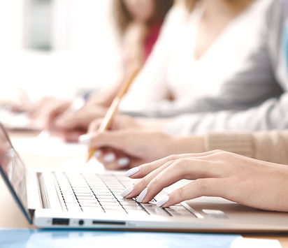 working together on a laptop to project manage utilities installation